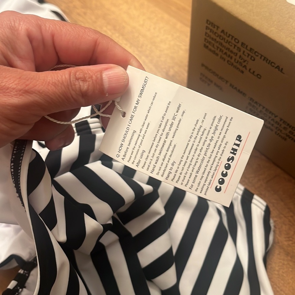 NWT Cocoship Swim Suite 
82% Nylon, 18% Elastane
Care Instructions
Hand Wash On - Picture 7 of 8